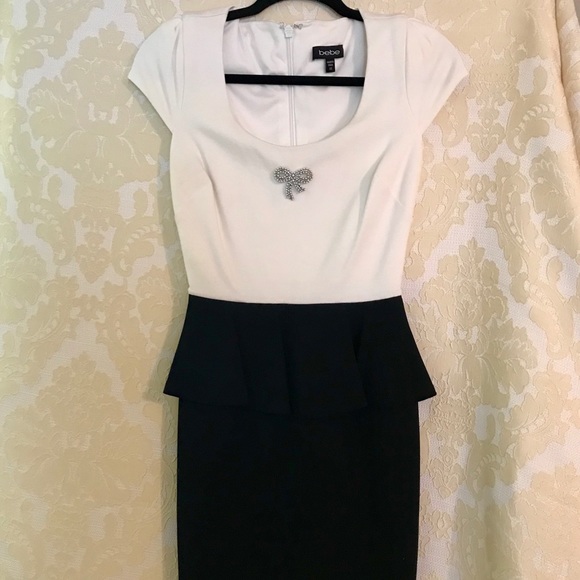 bebe Dresses & Skirts - Bebe dress with bow tie brooch - Size SX